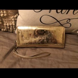 MK gold jet set wallet